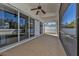 Covered patio with ceiling fan and outdoor view at 17152 Wintergarden Ave, Port Charlotte, FL 33948