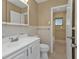 Main bathroom with vanity, toilet, and tub at 22206 Laramore Ave, Port Charlotte, FL 33952