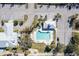 Community pool and clubhouse with ample parking at 2388 Silver Palm Rd, North Port, FL 34288