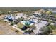 Community pool and clubhouse with ample parking and lake views at 2388 Silver Palm Rd, North Port, FL 34288