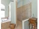 Walk-in shower and soaking tub in this bathroom at 2388 Silver Palm Rd, North Port, FL 34288