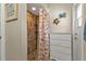 Small bathroom with shower stall at 2388 Silver Palm Rd, North Port, FL 34288