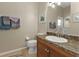 Small bathroom with toilet and vanity at 2388 Silver Palm Rd, North Port, FL 34288