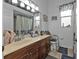 Bathroom with shower and tub combo, double vanity at 2388 Silver Palm Rd, North Port, FL 34288