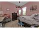 Bedroom with a double bed and dresser at 2388 Silver Palm Rd, North Port, FL 34288