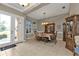 Bright dining room featuring a wood table and built-in hutch at 2388 Silver Palm Rd, North Port, FL 34288