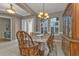 Charming dining room with a wood table and decorative accents at 2388 Silver Palm Rd, North Port, FL 34288