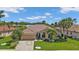 Single-Gathering home with tile roof and landscaped yard at 2388 Silver Palm Rd, North Port, FL 34288