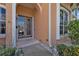 Inviting front entrance with double doors and stone accents at 2388 Silver Palm Rd, North Port, FL 34288
