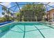 Enjoy this sparkling, screened pool with a spacious deck at 2388 Silver Palm Rd, North Port, FL 34288