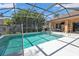 Large screened pool with spa, ideal for outdoor enjoyment at 2388 Silver Palm Rd, North Port, FL 34288