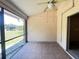 Relaxing outdoor patio with a ceiling fan for comfortable lounging at 25068 Harborview Rd # 1A, Punta Gorda, FL 33980