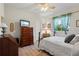 Cozy bedroom with a double bed, dresser and window at 2507 Via Veneto Dr, Punta Gorda, FL 33950