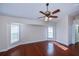 Spacious bedroom with wood floors and ceiling fan at 2578 Broad Ranch Dr, Port Charlotte, FL 33948