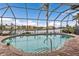 Relaxing pool with canal views at 3322 Sandpiper Dr, Punta Gorda, FL 33950