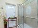 Bathroom features glass-enclosed shower and easy outdoor access at 3646 Madagascar Ave, North Port, FL 34286