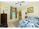 Inviting bedroom features bright light, comfortable furniture, and ample storage at 3646 Madagascar Ave, North Port, FL 34286