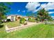 Charming single-story home featuring a well-manicured lawn and decorative landscaping at 3646 Madagascar Ave, North Port, FL 34286