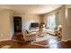 Cozy living room with a relaxed layout, showcasing comfortable seating and a warm atmosphere at 3646 Madagascar Ave, North Port, FL 34286