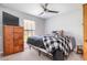 Cozy bedroom featuring a king-size bed and a vintage dresser at 4340 Adolph Ave, North Port, FL 34288