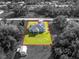 Aerial view showcasing a single-story house with a spacious backyard at 4340 Adolph Ave, North Port, FL 34288