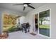 Relaxing screened porch with grill and access to the backyard at 4340 Adolph Ave, North Port, FL 34288