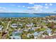 Bird's-eye view showcasing a house and its surroundings near the coast at 625 W Olympia Ave, Punta Gorda, FL 33950