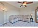 Relaxing living room with sectional sofa and large windows at 12566 Bacchus Rd, Port Charlotte, FL 33981