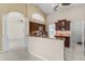 Kitchen with granite countertops and wood cabinets at 15460 Longview Rd, Port Charlotte, FL 33981
