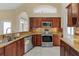 Kitchen with granite countertops and stainless steel appliances at 15460 Longview Rd, Port Charlotte, FL 33981