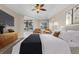 Relaxing main bedroom with a king-size bed and sliding doors leading to a pool view at 15460 Longview Rd, Port Charlotte, FL 33981