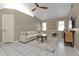Bright living room features a comfy sectional sofa and tile floors at 167 Mocha Ct, Punta Gorda, FL 33983
