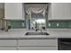 Kitchen sink with a window overlooking the backyard at 167 Mocha Ct, Punta Gorda, FL 33983