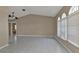 Spacious living room featuring tile floors and vaulted ceilings at 167 Mocha Ct, Punta Gorda, FL 33983