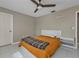 Guest bedroom with a full-size bed and ceiling fan at 167 Mocha Ct, Punta Gorda, FL 33983