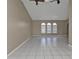 Large living room with vaulted ceiling and tile flooring at 167 Mocha Ct, Punta Gorda, FL 33983