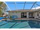 Spacious screened-in pool area with plenty of room for fun at 167 Mocha Ct, Punta Gorda, FL 33983