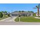 Single-Gathering home with driveway and landscaping at 167 Mocha Ct, Punta Gorda, FL 33983