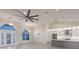 Open concept living area with high ceilings and modern kitchen at 17183 Ohara Dr, Port Charlotte, FL 33948