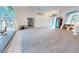 Bright and airy living room with access to the patio at 1900 Nuremberg Blvd, Punta Gorda, FL 33983