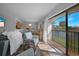 Bright living room with water view, comfy seating and hardwood floors at 23465 Harborview Rd # 1028, Punta Gorda, FL 33980