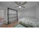 Bedroom with a full-size bed and window coverings at 23465 Harborview Rd # 1028, Punta Gorda, FL 33980