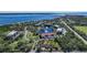 An aerial view showcasing the community's location and waterfront access at 23465 Harborview Rd # 1028, Punta Gorda, FL 33980