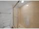 Shower stall with tiled walls and a glass door at 23465 Harborview Rd # 1028, Punta Gorda, FL 33980