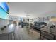 Spacious living area with comfy couches and hardwood floors at 23465 Harborview Rd # 1028, Punta Gorda, FL 33980