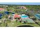 Resort-style pool, spa, shuffleboard, and tennis courts at 23465 Harborview Rd # 1028, Punta Gorda, FL 33980