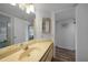 Bathroom with a single sink vanity and linen closet at 23465 Harborview Rd # 1028, Punta Gorda, FL 33980