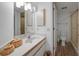 Clean bathroom with a single sink vanity and shower at 23465 Harborview Rd # 1028, Punta Gorda, FL 33980