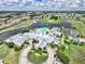 Community clubhouse with pool and tennis courts at 24229 Westgate Blvd, Punta Gorda, FL 33980