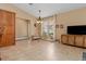 Dining area with tile floors and wood cabinets at 4410 Turnberry Cir, North Port, FL 34288